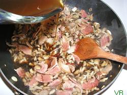 Rended bacon, mushrooms, adding sauce
