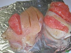 Uncooked chicken, ready to be broiled