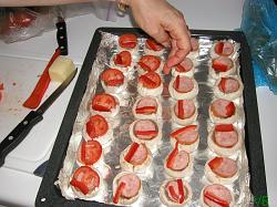 Mushrooms with sausages, bell peppers and tomatoes