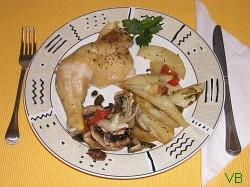 O porţie de pui cu garnitură.